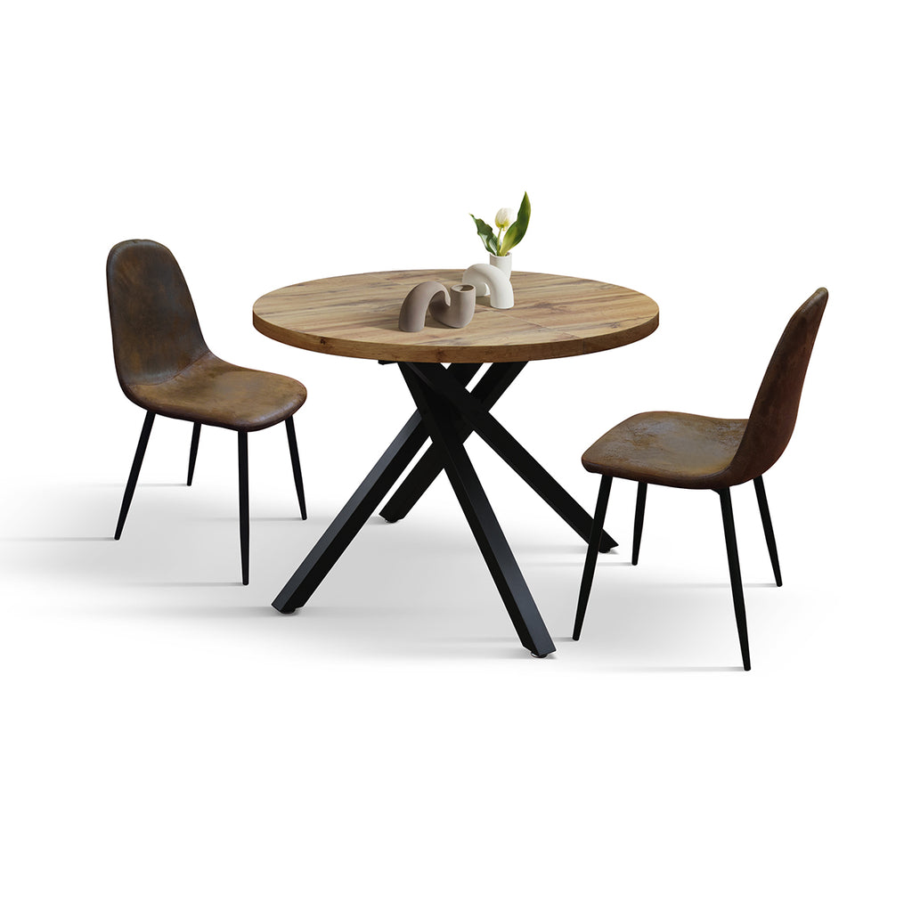 Tavolo Rotondo Allungabile Livia, vista laterale ravvicinata con sedie marroni e centrotavola decorativo